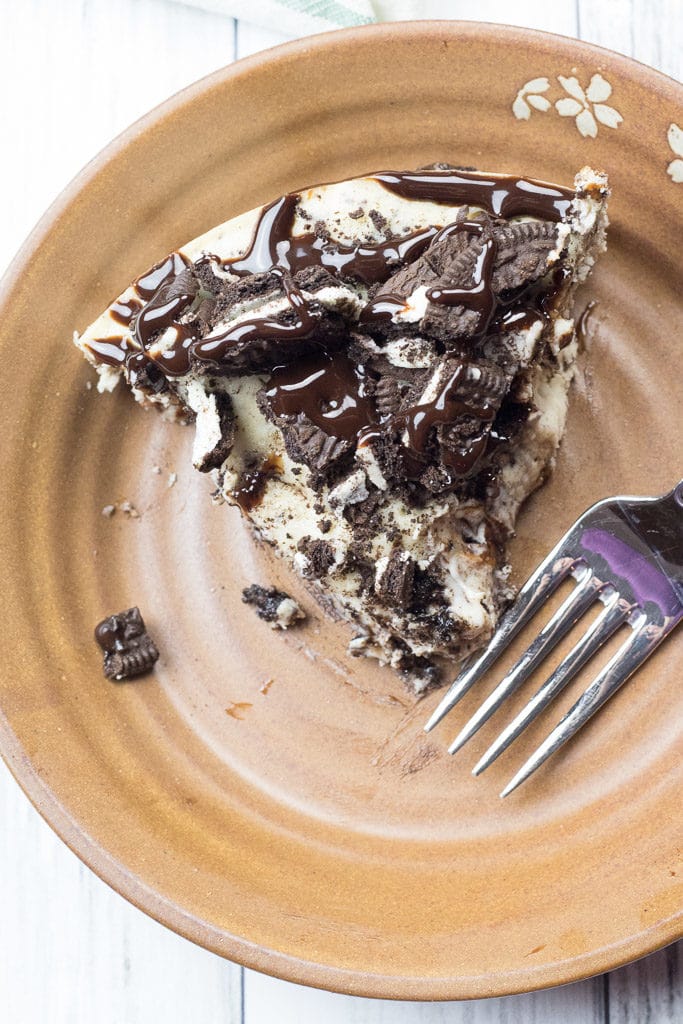 slice of instant pot oreo cheesecake on a plate