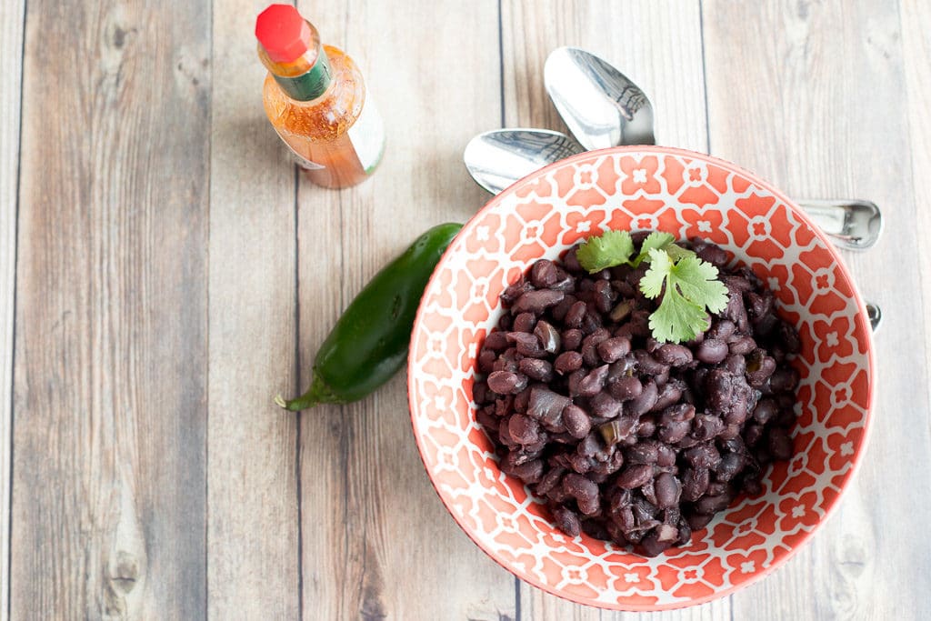 bowl of instant pot black beans on a table