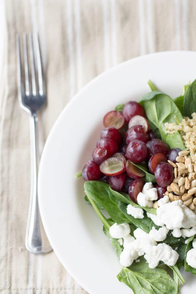 Spinach Quinoa Salad with Goat Cheese & Grapes